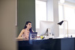 © Andy Paul - Caucasian Businesswoman in an office