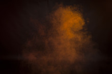 Orange  Smoke In A Dark Room. Texture, Background 