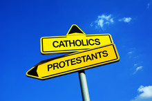 Catholics Vs Protestants - Traffic Sign With Two Options - Schism Of Christian Church, Reformed Christianity Of Protestantism Vs Traditional Catholicism Under Authority Of Pope And Vatican. 