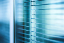 Window Blinds Close Up In The Office Building With Blue Color Tone Effect