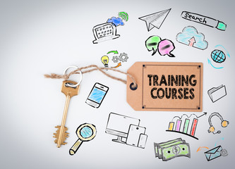 Wall Mural - Training Courses. Key and a note on a white background 