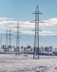 electric pole in nature in winter