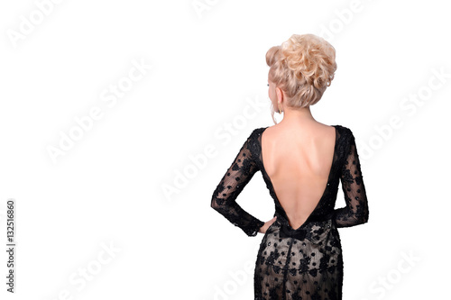 Beautiful Blonde Woman In Elegant Black Evening Low Cut Back Dress