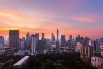 Wall Mural - Aerial view of Bangkok modern office buildings, condominium in Bangkok city downtown with sunset sky ,Bangkok is the most populated city in Southeast Asia. Bangkok , Thailand