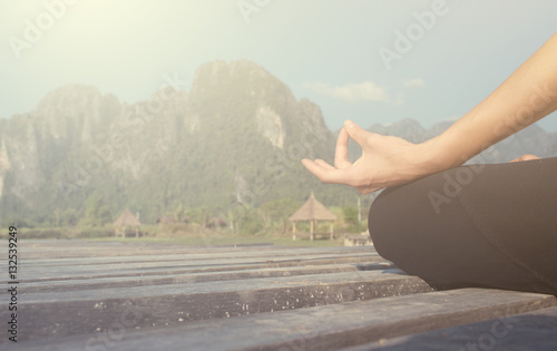 Fototapete - serenity and yoga practicing meditation