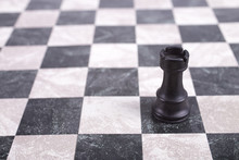 Black Wooden Rook On Chessboard