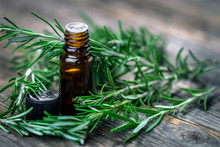 Rosemary Essential Oil And Fresh Rosemary