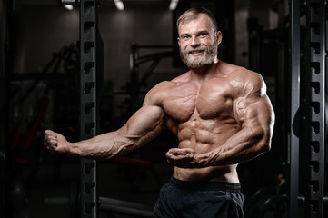  brutal muscular man with beard unshaven fitness model healthcare