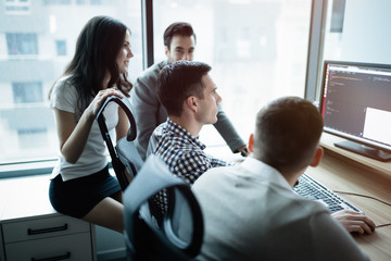 Wall Mural - group of business people and software developers working