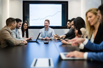 Business people conference in modern meeting room