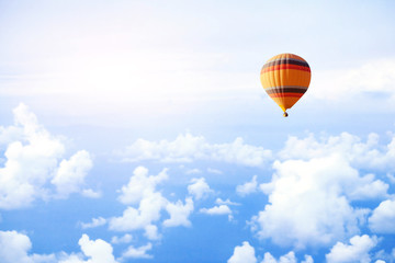 Wall Mural - dream or travel concept, fly in the sky on hot air balloon