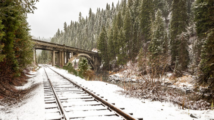 Wall Mural - Rainbow bridge in Idaho with train tracks in winter