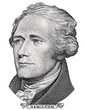 Alexander Hamilton face portrait on US 10 dollar bill closeup isolated, United States of America money close up.