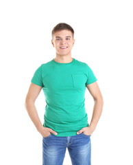 Wall Mural - Handsome young man in blank green t-shirt on white background