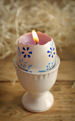 Wall Mural - Beautiful Easter candle with floral ornament, closeup