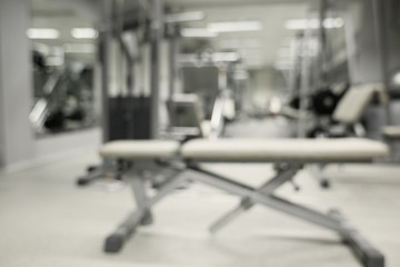 Canvas Print - Gym interior with equipment, blurred background