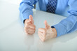 © akg-photography - Business man giving two big thumbs up