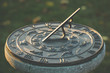 © jeffcampbell - Sundial during sunset, time concept
