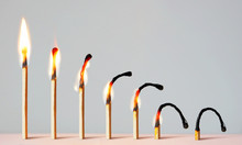 Concept Of Different Phases In Human Life. Abstract Image With Burning Matches