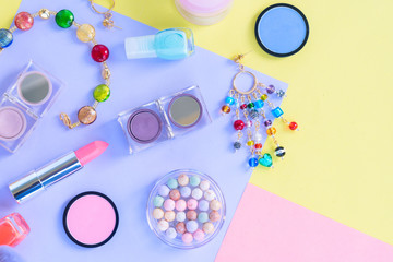 Wall Mural - Colorful make up products pop art flat lay scene