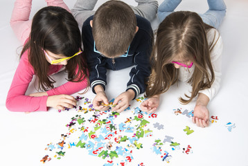 kids playing with puzzles