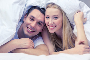 Poster - happy couple sleeping in bed