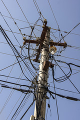 Electricity pole with lots of cables