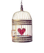 Heart inside the bird Cage. On white background. Love/romance concept.