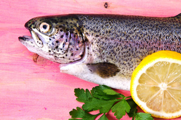 fish, fresh trout with lemon and parsley