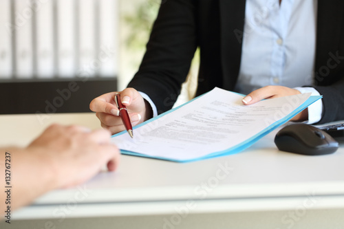 Fotografía Executive hands indicating where to sign contract