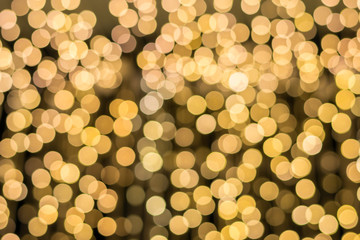Wall Mural - blur christmas lights or golden lights background. christmas lights concept.
