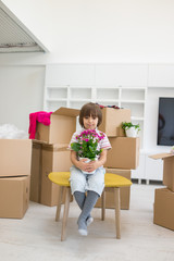 Little cute boy in empty room, remoove to new house home alone b