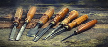 Old Used Wood Lathe Chisels Selection On The Wooden Table