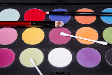 colorful eyeshadow palette and blush for make-up closeup