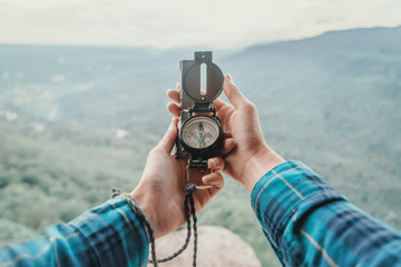 Wall Mural - In mountains with compass