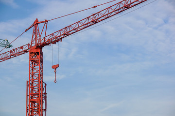 crane tower on sky background at construction site