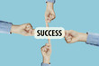 © Thermchai - Many hands fingers pointing with index fingers to Success text