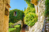 Fototapeta Uliczki - old buildings and narrow streets in village Eze in Provence, France
