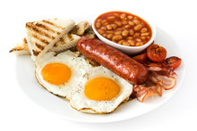 Traditional Full English Breakfast With Fried Eggs, Sausages, Beans, Mushrooms, Grilled Tomatoes And Bacon Isolated

