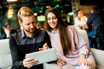 Young couple with tablet