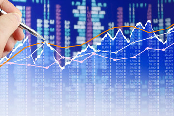 Fototapete - Businessman analyzing financial chart