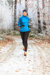running in the wintry forest