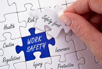 Work Safety Puzzle with female hand and text