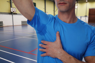Sport man armpit sweating. Transpiration stain. Hyperthyroidism concept