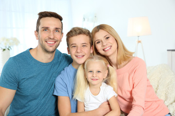 Canvas Print - Cute happy family in living room