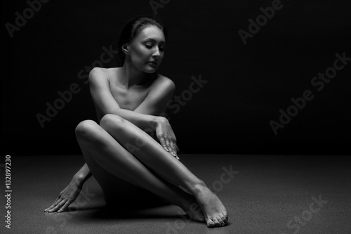 Fototapeta Naked woman body sculpture. Fine art photo of female body.