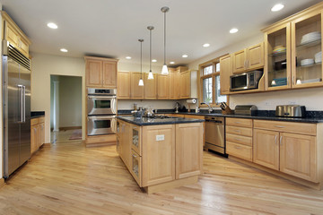 Large kitchen with oak wood cabinetry