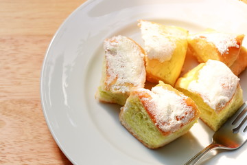 Sweet butter bread of dish on the wooden table.