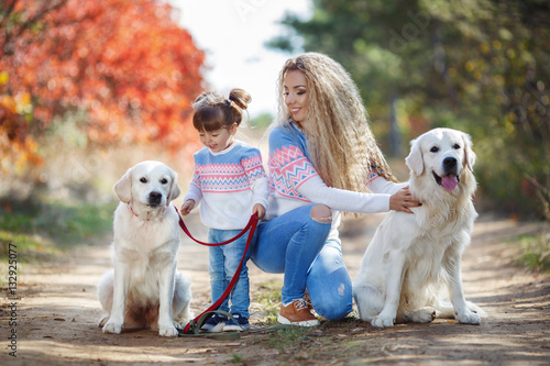 Family Portrait Of Young Blonde Woman With Long Wavy Hair And A