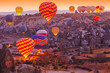 Scenic vibrant view of balloons flight in Cappadocia valley in s